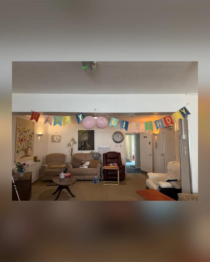 Birthday decorations displayed in the lounge ready for a celebration.