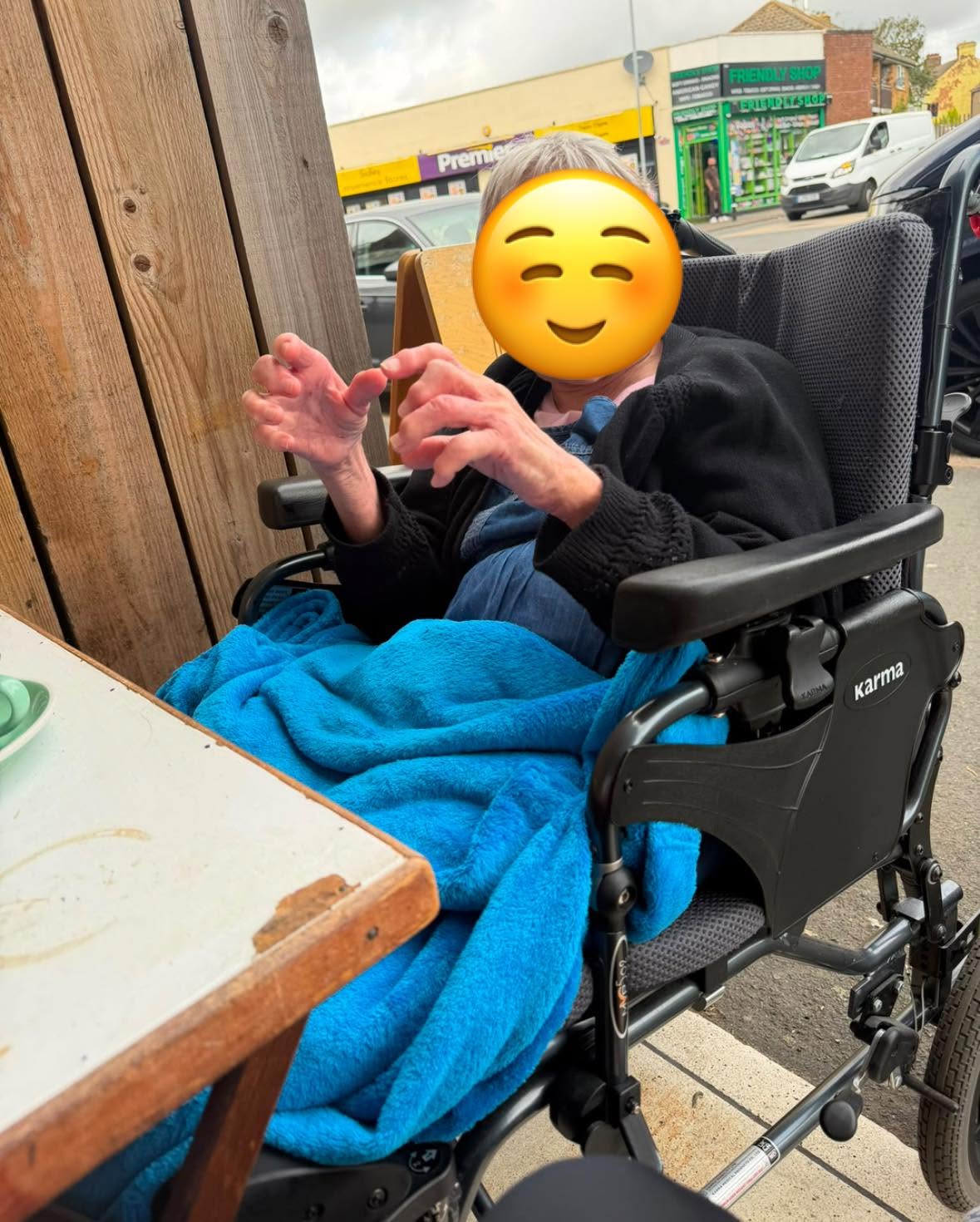 Older person enjoying time outdoors in a wheelchair